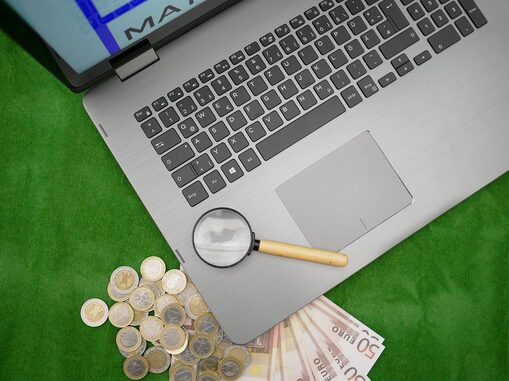 laptop and money